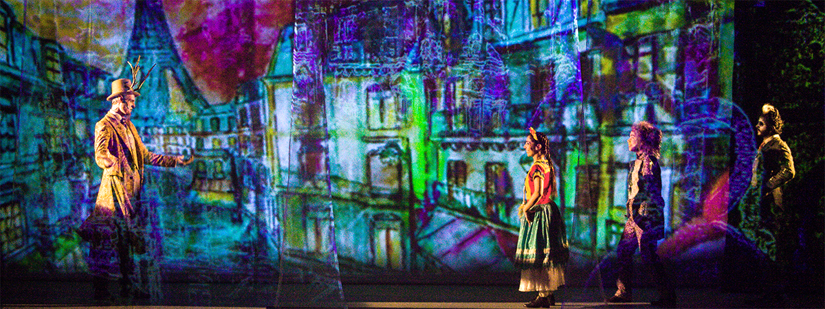 colourful imagery on projection tulle sets the tone for musical Las Aventuras de Frida