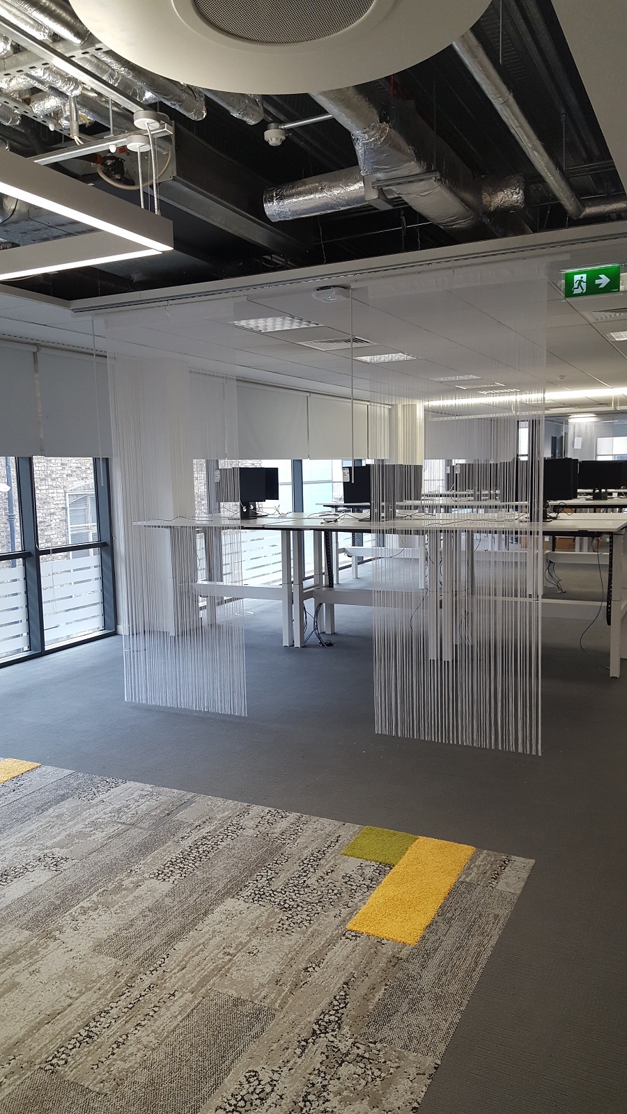 Office String Office Breakout Area: String curtains create separate zones in an open ...