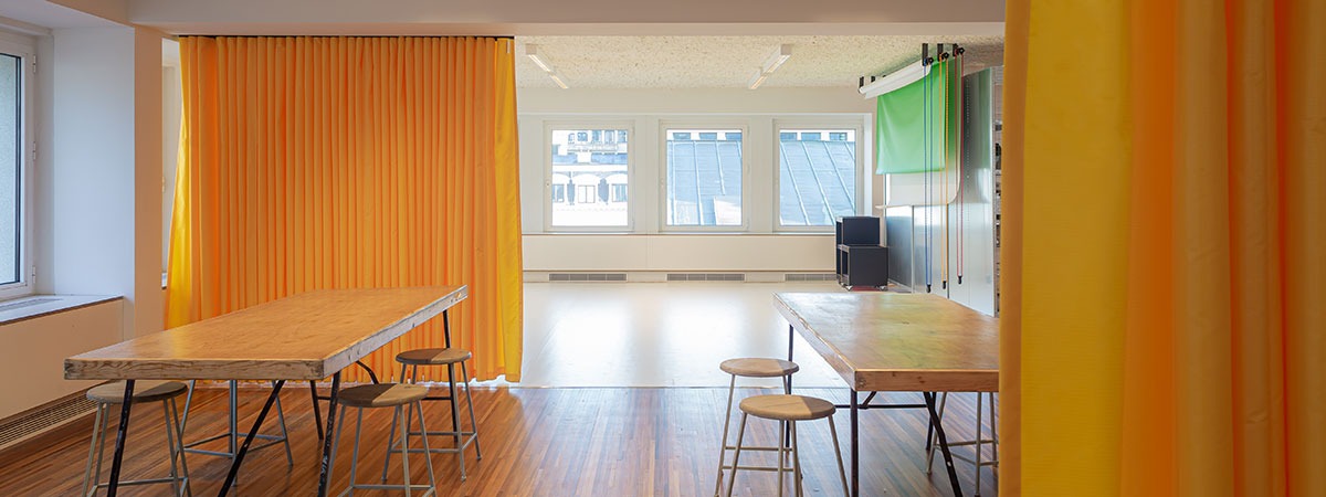 White vinyl as photo studio flooring in multi-purpose room