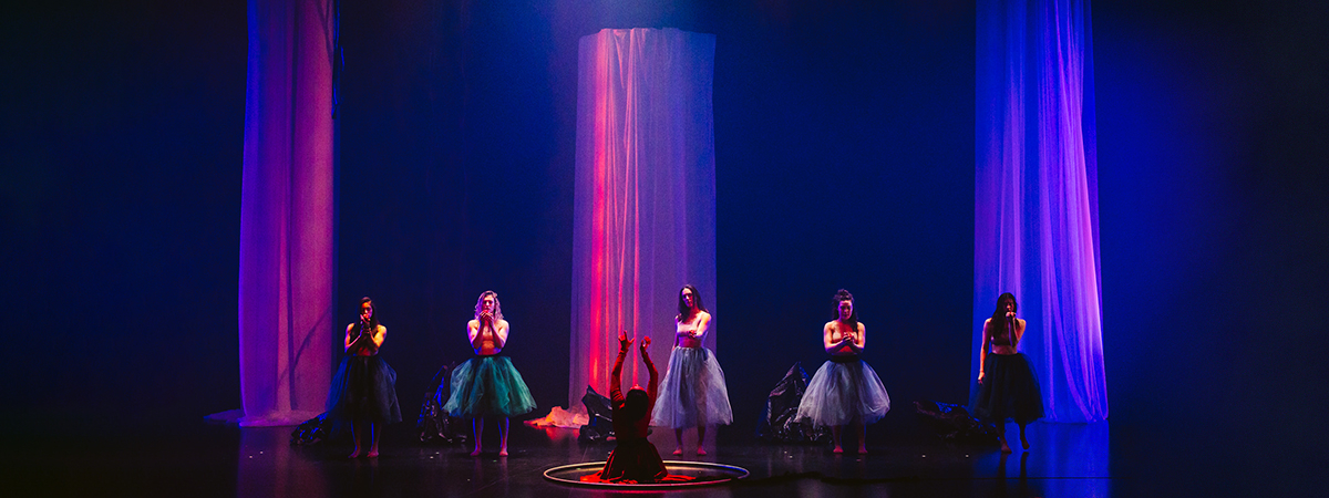  Colourful light effects on flame-retardant voile submerge the stage in a mesmerizing glow