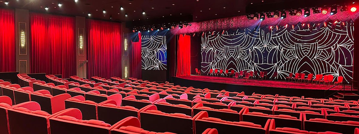 Red stage velvets dress up U Venue Theatre