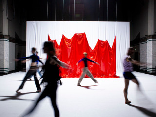ShowTex red and white LaqueFoil backdrop for L'exposé by Philip Berlin