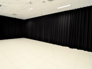 ShowTex black Velours Paris CS with 50% pleat on Rail H100 for the School of Tomorrow
