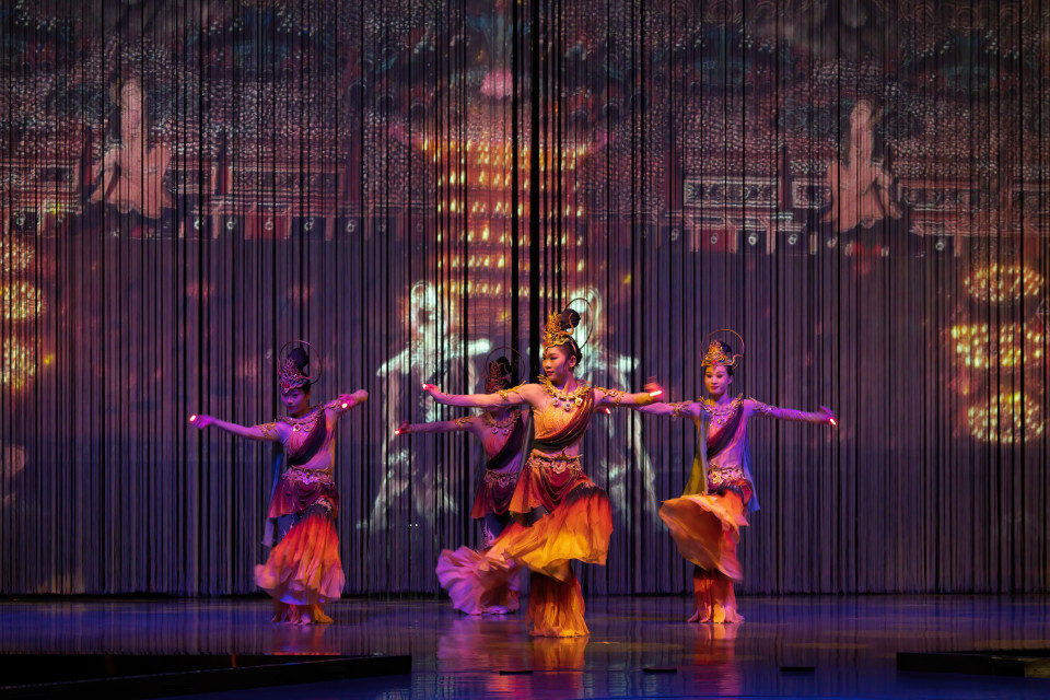 Projections on string curtains at Sound of Dunhuang
