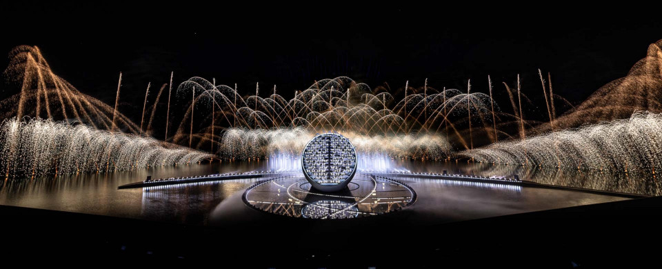 Custom coloured stretch fabrics mask the installation at the 50the UAE National Day