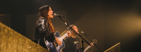 Golden stage backdrop on tour